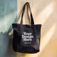 Instantly enhance your online store with our high-quality digital download of this blank tote bag mockup image! Perfect for showcasing your unique designs and artwork. By using our mockups, you can easily place your artwork on the bag and create a stunning visual representation of your products. ⚡ INSTANT DOWNLOAD: Your JPG file at size 2000px x 2000px is instantly downloaded after your payment has cleared with Etsy. No physical product will be sent to you. No refund on digital products. More information about Etsy downloads can be found here: https://www.etsy.com/help/article/3949 If you have trouble using this file, please contact me - I'm happy to help! ⚡ TERMS OF USE: You are allowed to use this product for personal and commercial use. You cannot resell this digital file. By utilising Customizable Black Canvas Bag For Daily Use, Customizable Black Canvas Bag For Everyday Use, Customizable Black Everyday Bags, Customizable Black Tote Shoulder Bag, Customizable Black Bag For Daily Use, Customizable Black Rectangular Canvas Bag, Customizable Black Tote Bag, Customizable Black Rectangular Bag, Shopping Bag Mockup