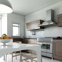 a white kitchen with wooden cabinets and an island in front of the stove top oven