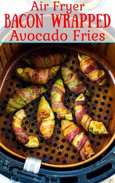 an air fryer with bacon wrapped avocado fries in it and text overlay