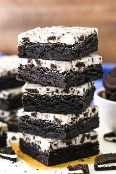 a stack of oreo cookies and cream brownies