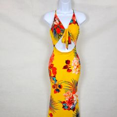 Cutout Yellow/Floral Maxi Dress From Touchdolls Boutique. Size Medium. Never Worn. Tags Still Attached Tropical Halter Neck Floral Print Sundress, Fitted Floral Print Maxi Dress For Holidays, Tropical Floral Print Halter Neck Dress, Tropical Halter Neck Dress With Floral Print, Tropical Halter Neck Floral Print Dresses, Tropical Print Halter Neck Maxi Dress For Party, Yellow Floral Print Halter Neck Maxi Dress, Halter Neck Maxi Dress With Tropical Print For Party, Hawaiian Floral Print Maxi Dress