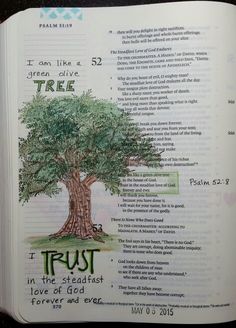 an open bible with the words trust and a tree on it's pages