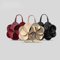 Introducing the Ezira Flower Petal Tote, a gorgeous addition to any wardrobe. the beautiful 3D petals design is crafted in exquisite details, Ezira tote is a truly unique and sophisticated piece. It's perfect for adding a touch of elegance to any outfit. Size: Round Tote - W28.5 x H20cm x D3cm / W11.22" x H7.87" x D1.18" Limited Quantities - Hurry! Gender: WOMEN Item Type: Handbags & Shoulder Bag Interior: Interior Slot & Zipper Pocket Material: High Quality Vegan Leather/PU Faux Leather Lining