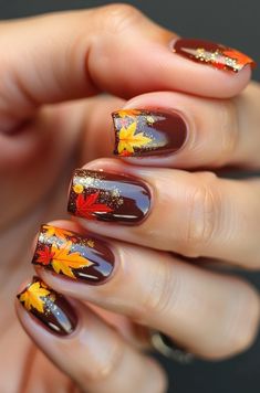 Get ready to fall in love with your nails this season! 🍁✨ Check out this stunning autumn-inspired nail art featuring deep brown hues and intricate leaf designs in vibrant fall colors. Perfect for adding a touch of elegance to your look. 🍂💅 #FallNails #NailArtInspiration #AutumnLeavesDesign #SeasonalManicure #ElegantNails #DIYNailArt #FashionForward” Fall Nails With Decals, Autem Gel Nails, Fall Leaves Manicure, Fall Nails With Pumpkins And Leaves, Thanksgiving French Tip Nail Designs, Fall Color For Nails, Fall Daisy Nails, Autumn Leaves Nail Art, Autumn Nails Leaves