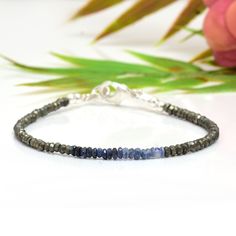 Skinny Pyrite & Ombre Blue Sapphire Bracelet in Sterling This bracelet is very dainty - beads measure about 3-4mm apiece AAA Quality Please Feel Free To Contact If You Have Any Query. Orders are shipped within 1 business working day, excluding orders made on Sunday or national holidays. Domestic delivery takes 5-7 business days. International delivery takes 11-23 business days. PAYMENT METHOD : PayPal only Please send all payments within 7 days . Return policy: We are very confident on our fine Adjustable Sapphire Bracelets With Gemstone Beads, Adjustable Sapphire Bracelet With Gemstone Beads, Sapphire Round Faceted Bead Bracelets, Adjustable Beaded Sapphire Bracelets, Adjustable Beaded Sapphire Bracelet, Adjustable Faceted Sapphire Bracelet, Adjustable Faceted Sapphire Bracelets, Faceted Sapphire Beaded Bracelets As Gift, Gift Sapphire Beaded Bracelets With Faceted Beads