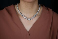 For Sale on 1stDibs - Elegant and finely crafted high end graduating diamond necklace showcasing a cluster of marquise, pear, and round brilliant diamonds. Elegantly arranged Diamond Collar, Brilliant Diamond, Collar Necklace, Round Brilliant, Creative Design, Diamond Necklace, Diamond Cuts, Pear, Diamonds