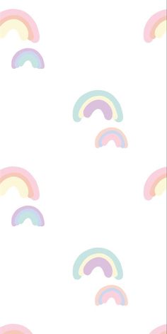 a white background with multicolored rainbows on it