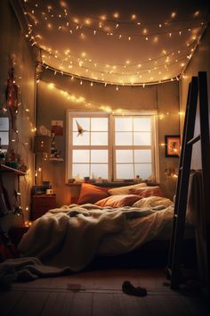 a bedroom with lights strung from the ceiling and a bed in front of a window