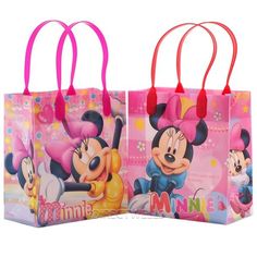 two minnie and mickey mouse shopping bags with handles on each side, one is pink and the other is red