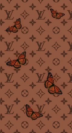 two orange butterflies on a brown background with black and white monogrammed letters in the bottom right corner