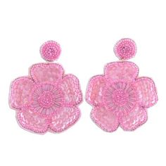 Five-petaled flowers dangle from beaded buttons in shades of pink in these fanciful earrings designed by India's Radhika. The flowers are attached by way of brass loops and feature round and tubular glass beads in shades of pink with rows of color-coordinated sequins for contrast. The beads are stitched together on a base of pink velvet and dangle freely from brass earring posts. Elegant Pink Flower Beaded Earrings, Pink Dangle Flower Earrings For Spring, Summer Party Flower Beaded Earrings, Pink Flower Charm Earrings For Spring, Pink Beaded Drop Flower Earrings, Pink Dangle Flower Charm Earrings, Pink Flower Beaded Earrings For Gift, Pink Earrings With Handmade Flowers For Spring, Pink Handmade Flower Earrings For Spring