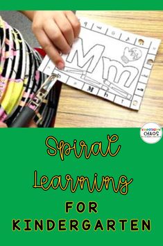 a child cutting paper with scissors and the words spring learning for kids on it, in front of a green background