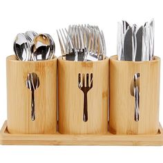 a bamboo holder with forks and spoons in it