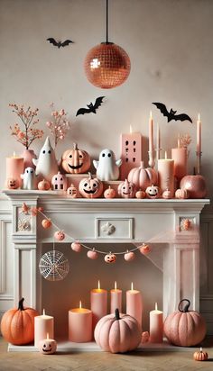 a fireplace with candles and pumpkins on it