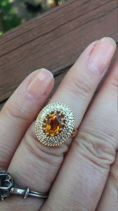 Stunning Vintage Wedding Engagement Cocktail ring, made from 14k Yellow Gold, Gorgeous Citrine and Rose Cut Diamonds... Weight is 6.6 Grams Size is 7, Sizable. Rose cut Diamonds. Layaway plan is available Gold Wedding Jewelry With Certificate Of Authenticity, Oval Wedding Rings With Certificate Of Authenticity, Orange Diamond Accented Jewelry For Weddings, Orange Topaz Wedding Ring With Center Stone, Oval Jewelry With Certificate For Anniversary, Elegant Orange Topaz Wedding Ring, Hallmarked Topaz Ring For Wedding, Citrine Wedding, Rose Cut Diamond