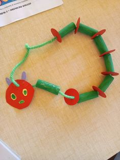 Very Hungry Caterpillar Necklace Craft, Minibeast Crafts For Kids, The Very Hungry Caterpillar Activities For Preschoolers, The Very Hungry Caterpillar Crafts, Caterpillar Snack, Eric Carle Activities Preschool, Very Hungry Caterpillar Craft