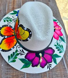 Beautiful handmade painting Mexican hat this beautiful handmade painting Mexican hat is perfect to add that special touch to any outfit  this hat is structure with high crown an the wide brim had beautiful painting designs  very important about shipping  all items in LTFMEX are shipping in corrugated box for protect our products Handmade Panama Hat For Kentucky Derby, Unique Handmade Fedora For Beach, Unique Handmade Fedora For The Beach, Custom Handmade White Fedora, Custom White Handmade Fedora, Hand Painted Curved Brim Sun Hat For Festivals, Handmade Multicolor Fedora Sun Hat, Custom Hand Painted Brimmed Fedora, Hand Painted Brimmed Hats For Kentucky Derby