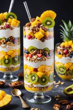 fruit and yogurt parfait with granola toppings in glass cups