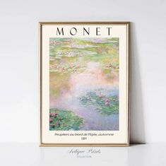 the cover of monet magazine, featuring water lillies and pink flowers on a white background