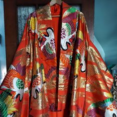 Beaitiful Bright Colored Wedding Kimono. Orange Base Color With Gorgeous Cranes Embroidered In Gold Metallic, White, Green, Purple Blue, Yellow. Never Worn, Used For Display Only. Missing Obi. Silk Kimono For Wedding And Festive Occasions, Vintage Red Kimono For Wedding, Traditional Red Kimono For Wedding, Wedding Embroidered Kimono With Kimono Sleeves, Embroidered Wedding Kimono, Embroidered Festive Kimono For Wedding, Festive Embroidered Wedding Kimono, Festive Wedding Embroidered Kimono, Bright Colored Wedding