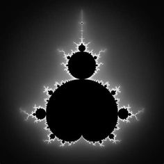 an abstract black and white image with stars in the center, on a dark background