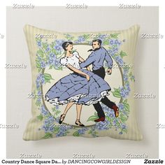 a pillow with an image of a man and woman dancing