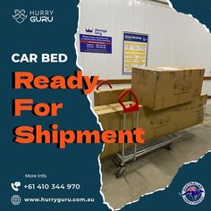 a cart with boxes sitting on top of it next to a sign that says, car bed ready for shipping