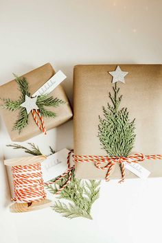 wrapping presents with twine and evergreen branches