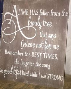 a wooden sign with an american flag and the words, limb has fallen from the family tree that says grieve not for me