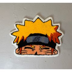 a sticker depicting a cartoon character wearing a hat