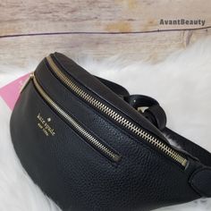 Name - Kate Spade Belt Bag Leila Black Leather Fanny Bag More Details - Approx. Measurements: Top Length : 10 Inches Bottom Length: 6.5 Inches Depth: 3.5 Inches Height: 5 Inches Max Belt Length: 46 Inches + Bag Is Authentic ++ From Smoke Free & Pet Free Home +++ No Trades ++++ Check Out My Other Listings I Have Available From Avantbeautybags Photos Are Taken With Bright Lighting And Colors May Vary Under Different Conditions (Your Device, Monitor, Etc). Chic Pouch Belt Bag With Zipper Closure, Chic Pouch Belt Bag With Zipper, Elegant Belt Bag For Daily Use With Zipper, Elegant Crossbody Belt Bag With Zipper Closure, Elegant Crossbody Belt Bag With Zipper, Luxury Black Belt Bag With Zipper Closure, Elegant Belt Bag With Zipper Pocket For Everyday Use, Elegant Belt Bag With Zipper Closure For Travel, Elegant Belt Bag With Zipper Pocket