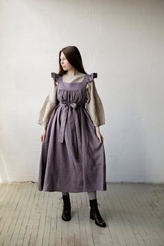 Prairie dress is made from 100% soft and washed linen. Details: - Colour: Mauve - Composition: 100% Oeko-Tex certified linen - Flutter sleeves - Coconut buttons down the back - Medium weight linen - Linen care: machine wash gentle; tumble dry low, ironing optional - The price is for one dress, other pictured items are not included Dress With Wings, Dress With Flutter Sleeves, Linen Dress Women, Mauve Dress, Dress Linen, Prairie Dress, Linen Dresses, Linen Women, Flutter Sleeves