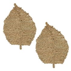 two pieces of woven fabric with leaves on them