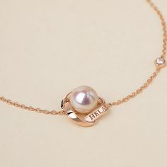 18K rose gold and Akoya pearl Pearl Size: 6.5-7.0 mm Chain length: 18.5 cm (adjustable) Weight of Diamonds: 1 diamond approx. 0.035 carats Handpicked of every pearl, only the top 1% of pearls are selected The bracelet can be customized with letters, replacing "HELAS" with other content, defaulting to "HELAS" if no specific instructions are provided. Custom-made products are non-refundable or exchangeable for reasons other than quality issues. For 18K white gold or 18K yellow gold, contact helas@ Formal Rose Gold Pearl Bracelet, Adjustable Rose Gold Pearl Bracelet For Formal Occasions, Elegant Rose Gold Bracelet With Pearl Charm, Elegant Rose Gold Pearl Bracelet With Charm, Luxury Rose Gold Pearl Bracelet Gift, Elegant Rose Gold Pearl Chain Bracelet, Elegant Adjustable Pink Gold Necklace, Elegant Pink Gold Adjustable Necklace, Elegant Rose Gold Pearl Bracelet For Anniversary