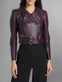 Revolutionize your wardrobe with the bold and trendy allure of the Women's Cropped Leather Biker Jacket, a fashion-forward statement piece that seamlessly merges the classic edge of a biker jacket with the modern flair of a cropped silhouette. This jacket isn't just outerwear; it's a bold fashion statement that captures attention and exudes an energetic and chic vibe. Crafted with precision from high-quality leather, the Cropped Leather Biker Jacket promises not only a sleek and stylish exterior Chic Biker Jacket With Zip Fly For Workwear, Biker Style Cropped Jacket For Work, Modern Long Sleeve Outerwear For Night Out, Fitted Cropped Leather Jacket For Winter, Modern Biker Jacket With Asymmetrical Zip For Winter, Cropped Fitted Biker Jacket For Fall, Modern Biker Jacket With Asymmetrical Zip For Work, Modern Leather Jacket For Night Out In Fall, Modern Winter Outerwear For Night Out