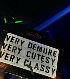 a sign that says very demure very cute