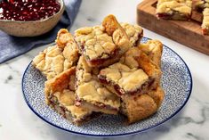 When I need a delicious treat and am short on time and groceries, I make these 2-ingredient jam bars. All you need is store-bought sugar cookie dough and jam to make these holiday-worthy bars. #dessert #dessertideas #easydesserts