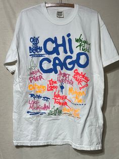 Spray paint don't, Classic! Vintage 1990s colours by Chouinard Chicago T-shirt. Size large. 100% cotton. Made in Honduras. Vintage Pride Parade, Urban Multicolor Summer T-shirt, Multicolor Urban Style Summer T-shirt, Urban Multicolor Graffiti Print T-shirt, 90s Style Cotton T-shirt With Graffiti Print, Graffiti Print T-shirt For Summer, Summer Fan Merchandise T-shirt With Graffiti Print, Britpop Aesthetic, 90s Shirts Graphic Tees