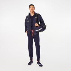 Official FIGS® Outerwear. Get Free Shipping On Orders $50+! | FIGS Mens Navy On-Shift Extremes Jacket™ Navy Sportswear Outerwear With Pockets, Sports Outerwear With Functional Pockets, Sports Outerwear With Functional Pockets And Long Sleeves, Navy Sports Outerwear With Ribbed Cuffs, Sporty Outerwear With Functional Pockets For Travel, Dark Harbor, Vest Layering, Lab Coats, Racing Gear