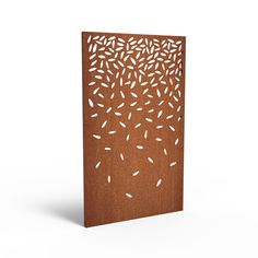 a brown card with white leaves on it