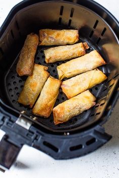 some food is being cooked in a deep fryer