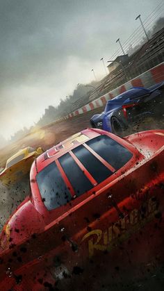 the cars are racing in front of each other on a race track with rain pouring over them