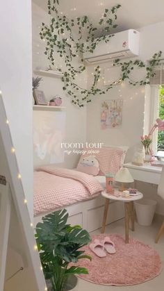 a bedroom with white walls and pink bedding is decorated with greenery in the corner