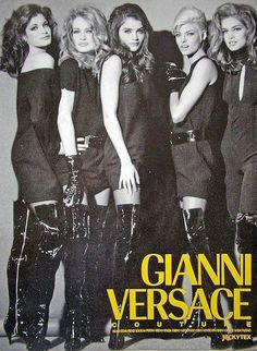 the cover of vanity magazine showing four women in black dresses and boots, posing for a photo