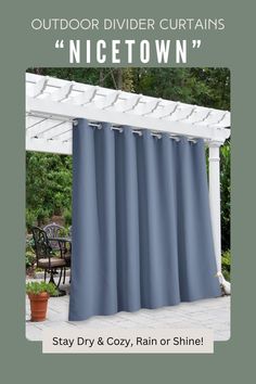 an outdoor patio curtain with text stating stay dry and cozy rain shines on it