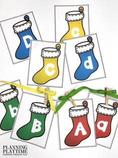 printable christmas stocking cards for kids to practice letter recognition and matching letters with clothes pins