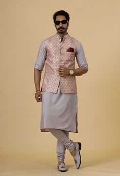 Important Instructions : We request you to kindly calculate the processing time of your order  after the mutual confirmation on Bespoke measurements between us has taken place (either via message , e mail or form) "Crafted with Passion in India; loved by men across the USA, Canada, Europe" Product Specifications : Material: Banarasi Silk Color: Rose Gold Jacket with Lilac Kurta Pajama Collar type: Mandarin Jawahar Jacket With 6 Buttons in Front Package contents: 1 Half Jodhpuri Jacket + 1 Kurta- Pink Nehru Jacket For Diwali With Traditional Drape, Pink Dabka Nehru Jacket For Festive Occasions, Pink Nehru Jacket With Zari Work For Festive Occasions, Pink Traditional Nehru Jacket For Festive Season, Pink Nehru Jacket With Zari Work For Diwali, Traditional Pink Nehru Jacket For Festive Occasions, Festive Pink Nehru Jacket With Zari Work, Pink Nehru Jacket For Diwali, Pink Nehru Jacket For Festive Occasions