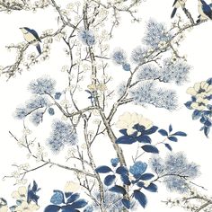 a blue and white floral wallpaper with birds on the branches in front of it