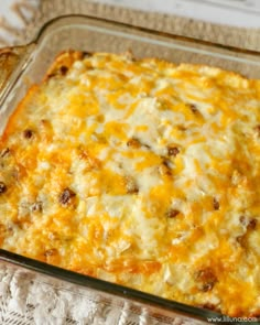 a casserole dish with cheese and meat in it