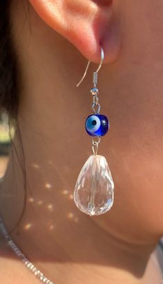 High quality natural clear quartz with evil eye protection. Sparkles under the sunlight Evil Eye Protection, Evil Eye Earrings, Eye Earrings, Eye Protection, Long Beach, Clear Quartz, Evil Eye, Jewelry Earrings Dangle, Dangle Drop Earrings